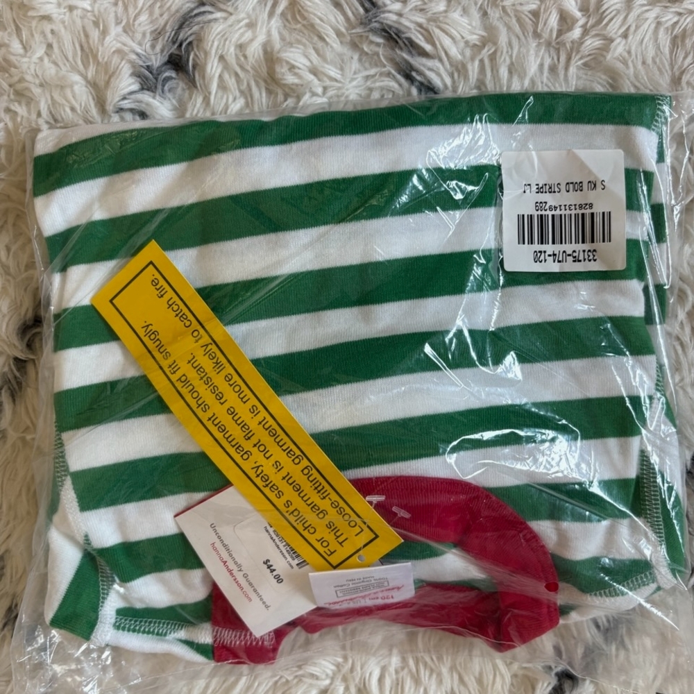 Green and White Striped Shirt with Red Accents